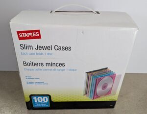 Staples Slim Jewel CD/DVD Cases 100/Pack New In BOX 50 Clear/Black & 50 Colors